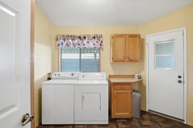 a utility room with dryer and washer