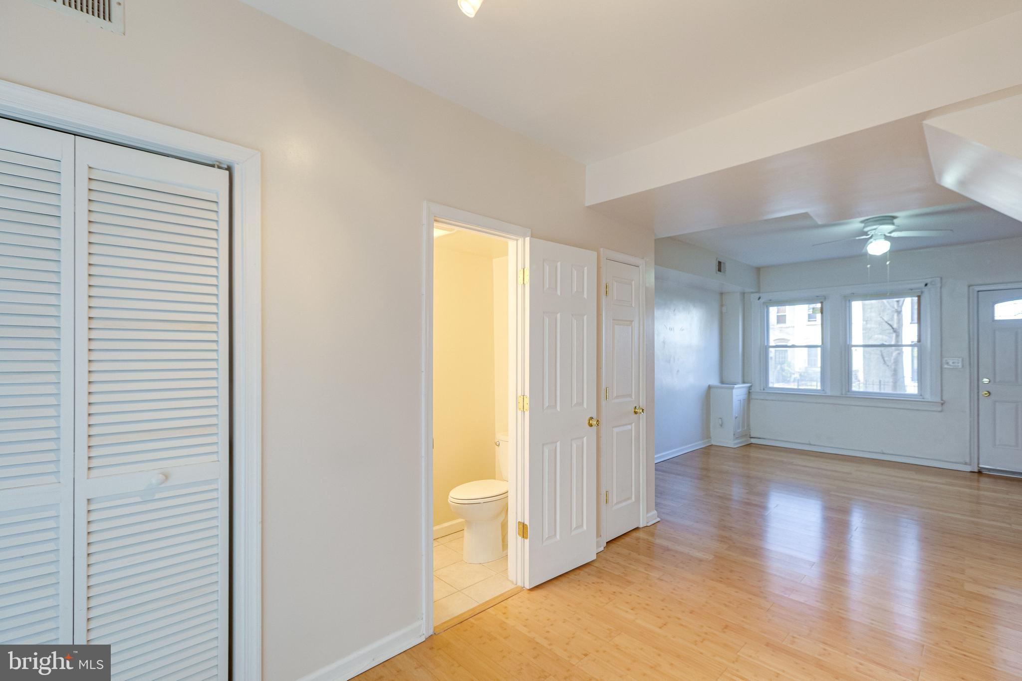 1119 3rd Street Northeast Washington, DC 20002 - Photo 16 of 31 a view of livingroom with hardwood floor and window