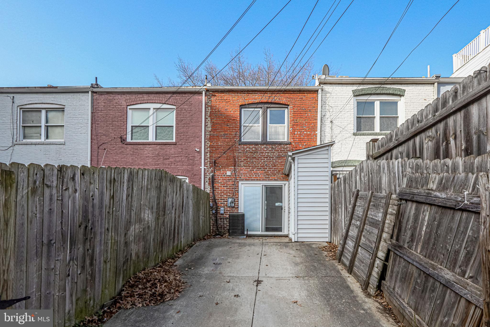 1119 3rd Street Northeast Washington, DC 20002 - Photo 29 of 31 a front view of a house with wooden fence