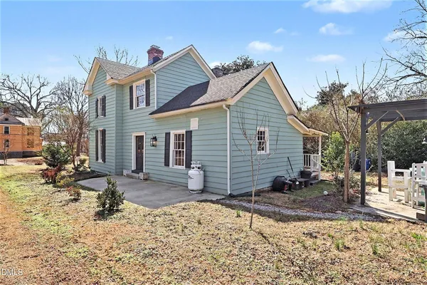a view of a house with a patio