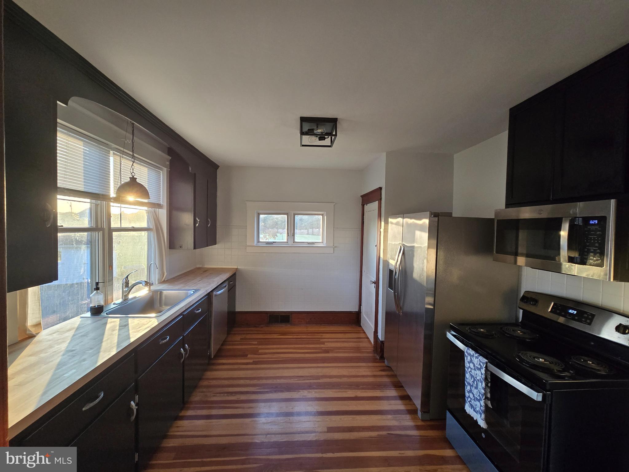 14198 Union Street Milton, DE 19968 - Photo 20 of 49 Modern kitchen with sleek finishes.