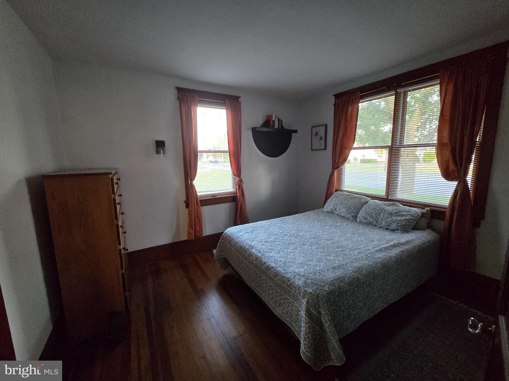 14198 Union Street Milton, DE 19968 - Photo 25 of 49 Cozy bedroom with natural light and charm.
