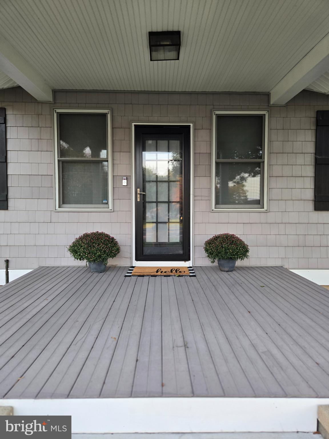 14198 Union Street Milton, DE 19968 - Photo 40 of 49 Charming entryway with welcoming greenery.