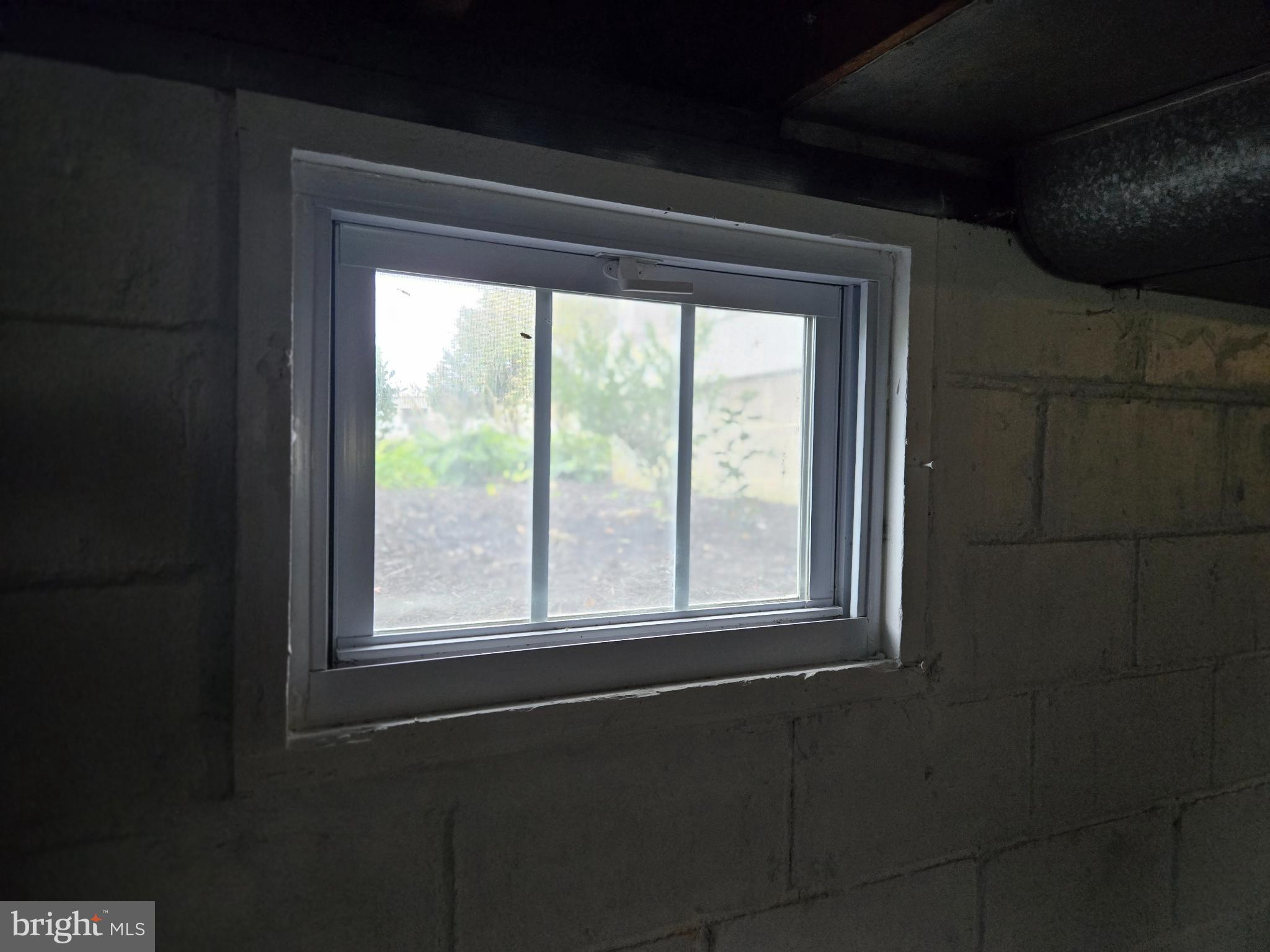 14198 Union Street Milton, DE 19968 - Photo 43 of 49 Natural light filters through new basement windows