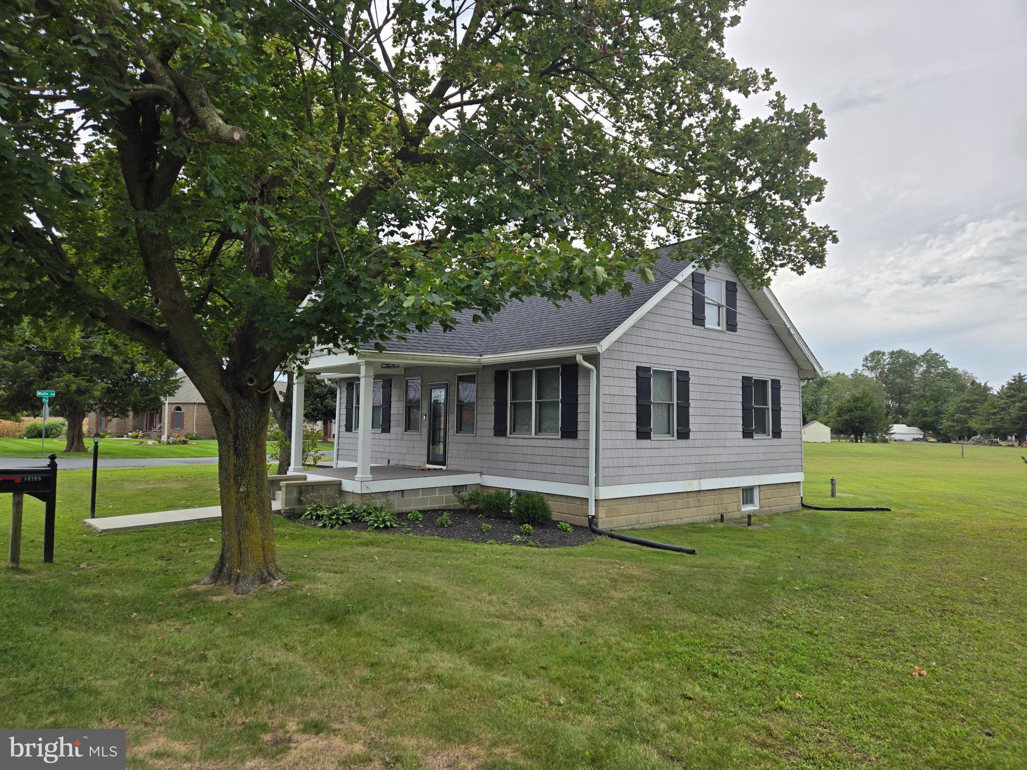 14198 Union Street Milton, DE 19968 - Photo 8 of 49 Charming home nestled in lush greenery.