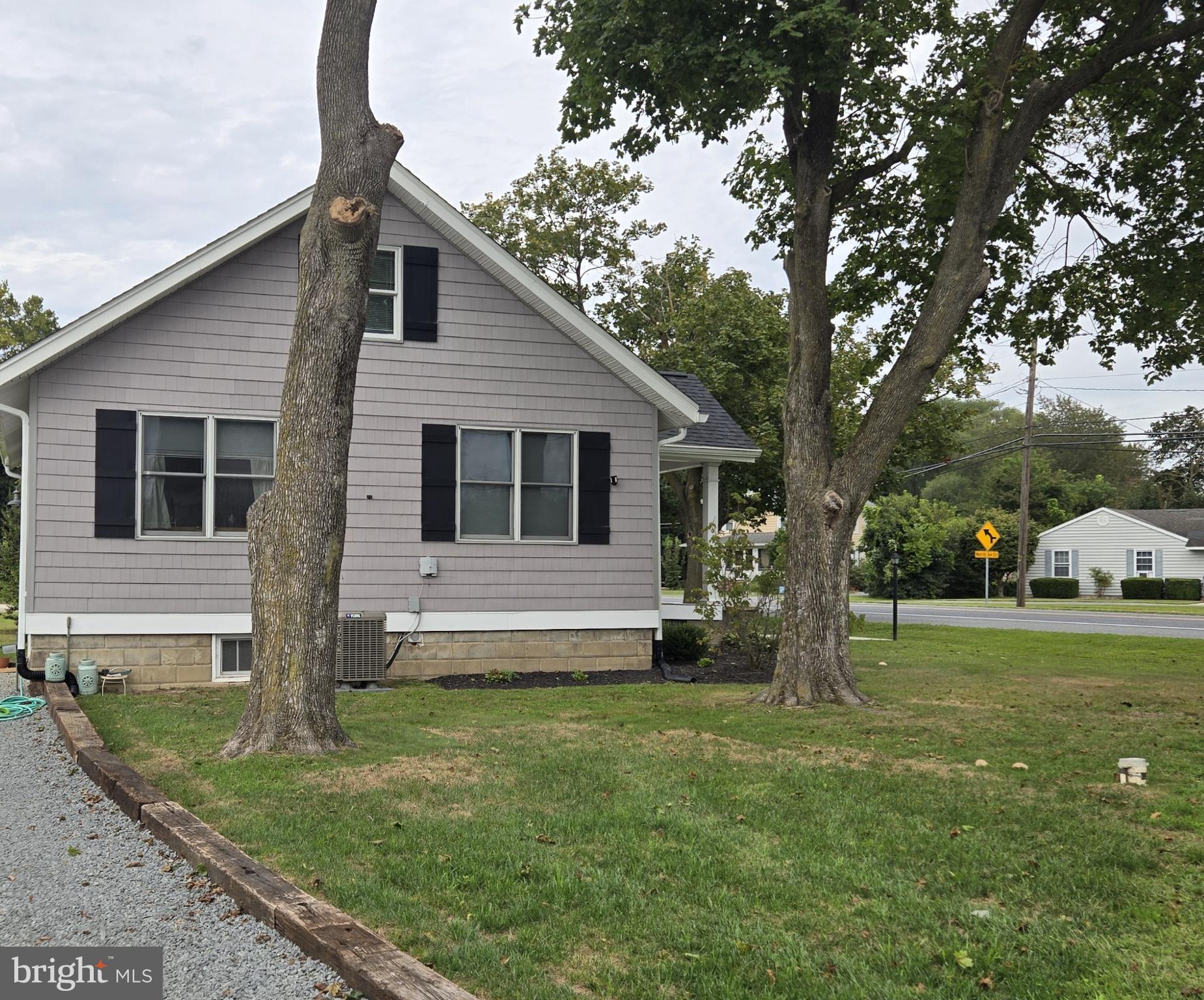 14198 Union Street Milton, DE 19968 - Photo 9 of 49 Charming home nestled among leafy trees.