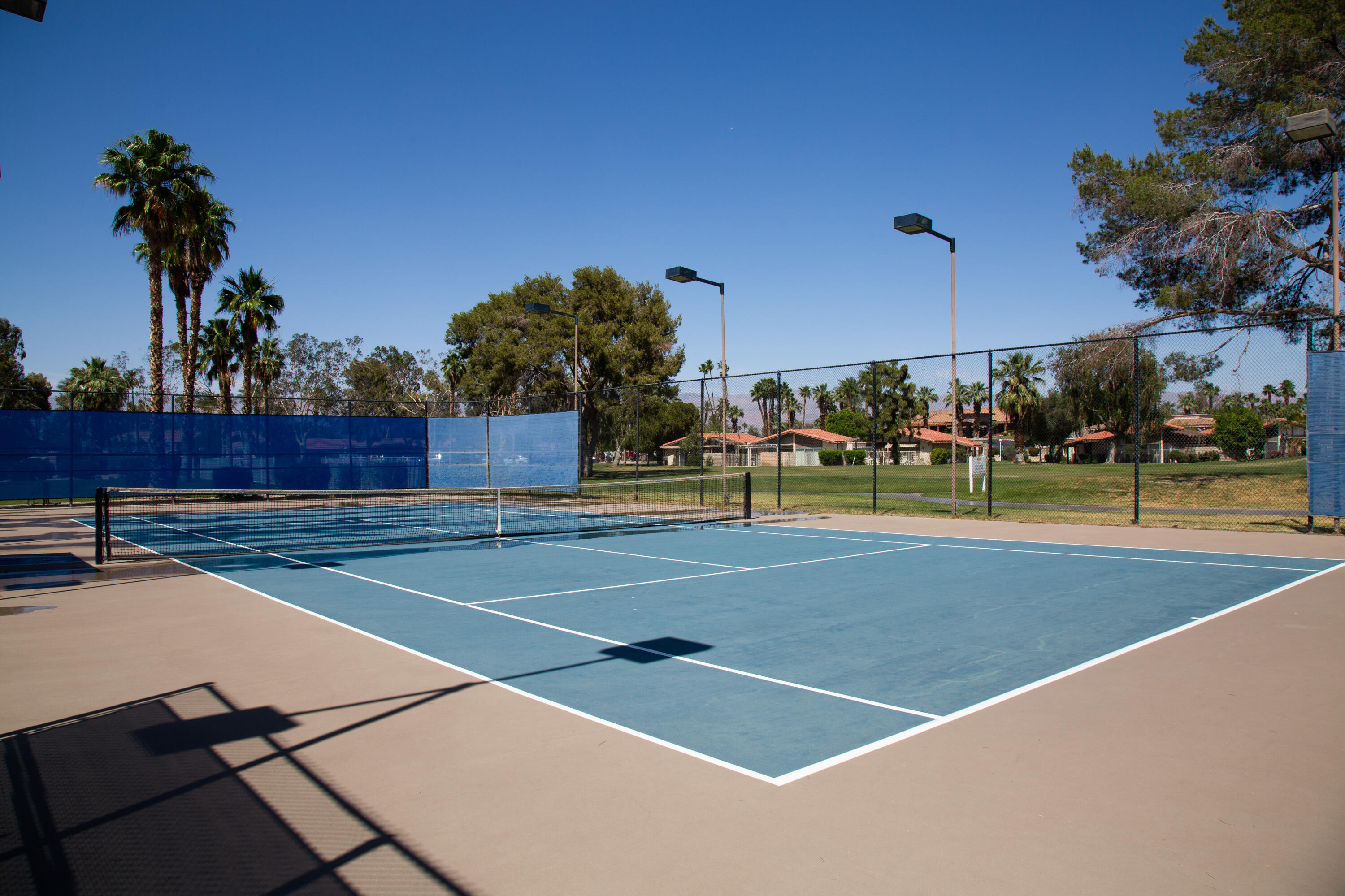 82567 Ave 48, Unit 103 Indio, CA 92201 - Photo 23 of 26 a view of a tennis court