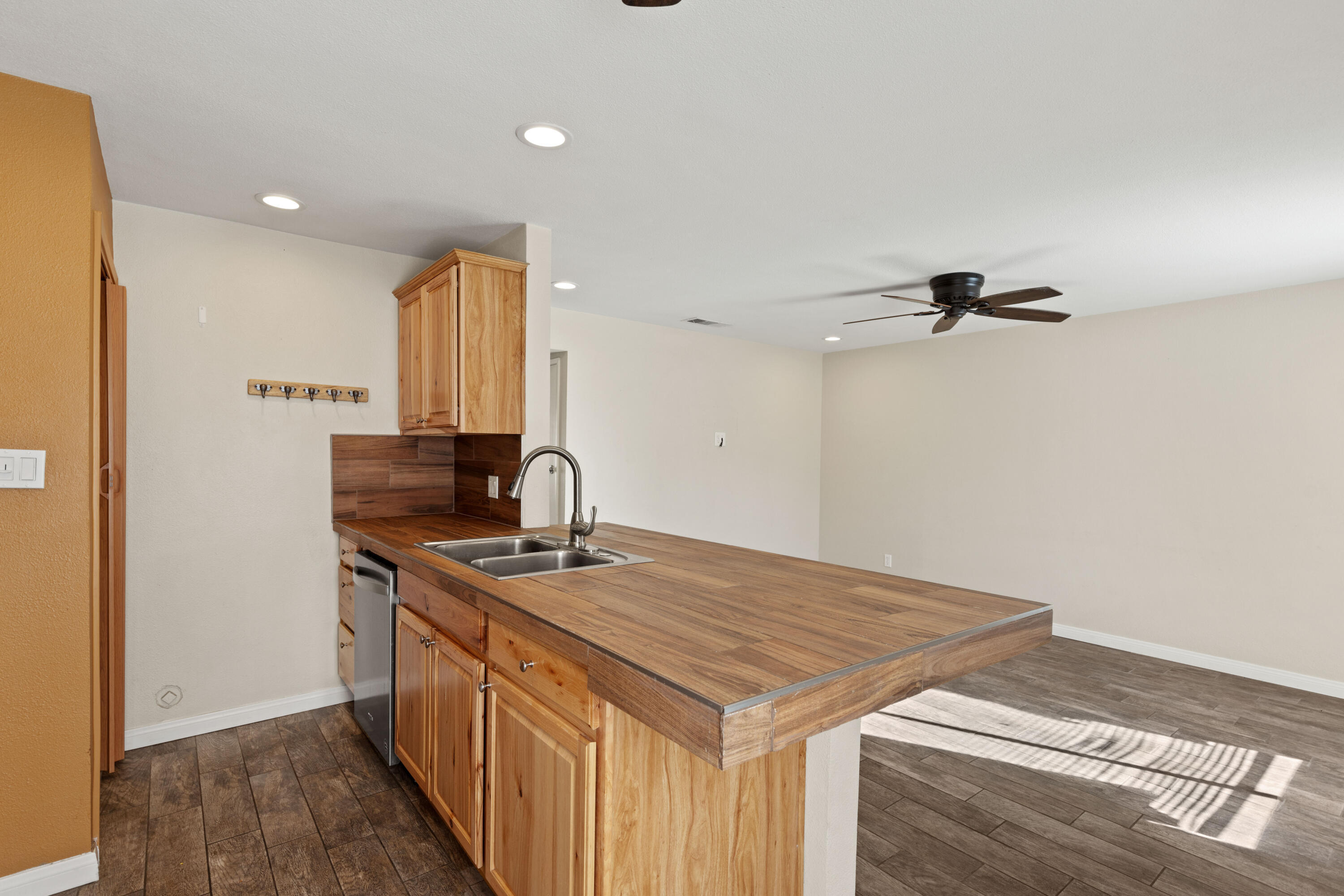 82567 Ave 48, Unit 103 Indio, CA 92201 - Photo 5 of 26 a kitchen with a sink and cabinets