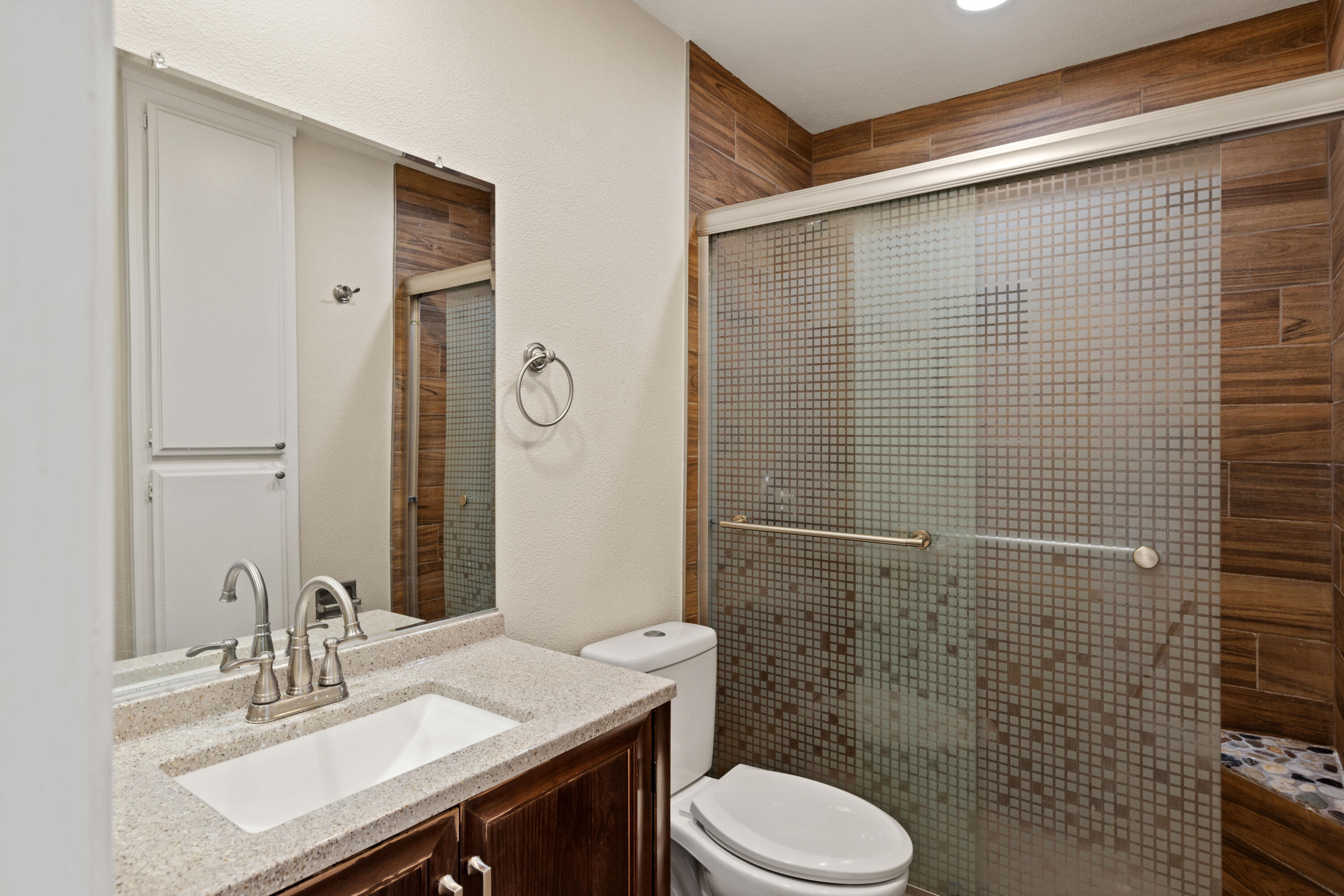 82567 Ave 48, Unit 103 Indio, CA 92201 - Photo 9 of 26 a bathroom with a sink toilet and shower