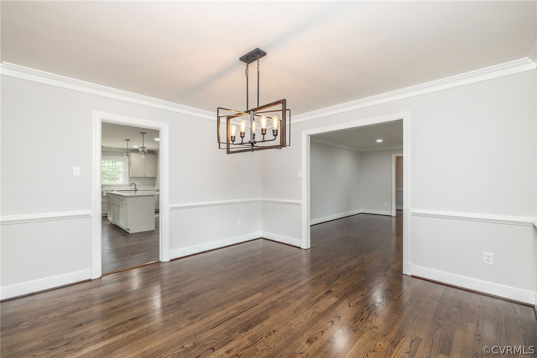 11633 Boyd Road Chester, VA 23831 - Photo 11 of 49 an empty room with wooden floor mirror and windows