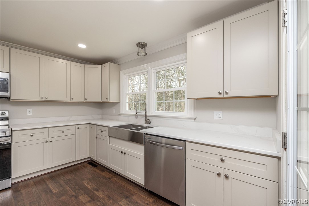 11633 Boyd Road Chester, VA 23831 - Photo 17 of 49 a kitchen with sink cabinets and window
