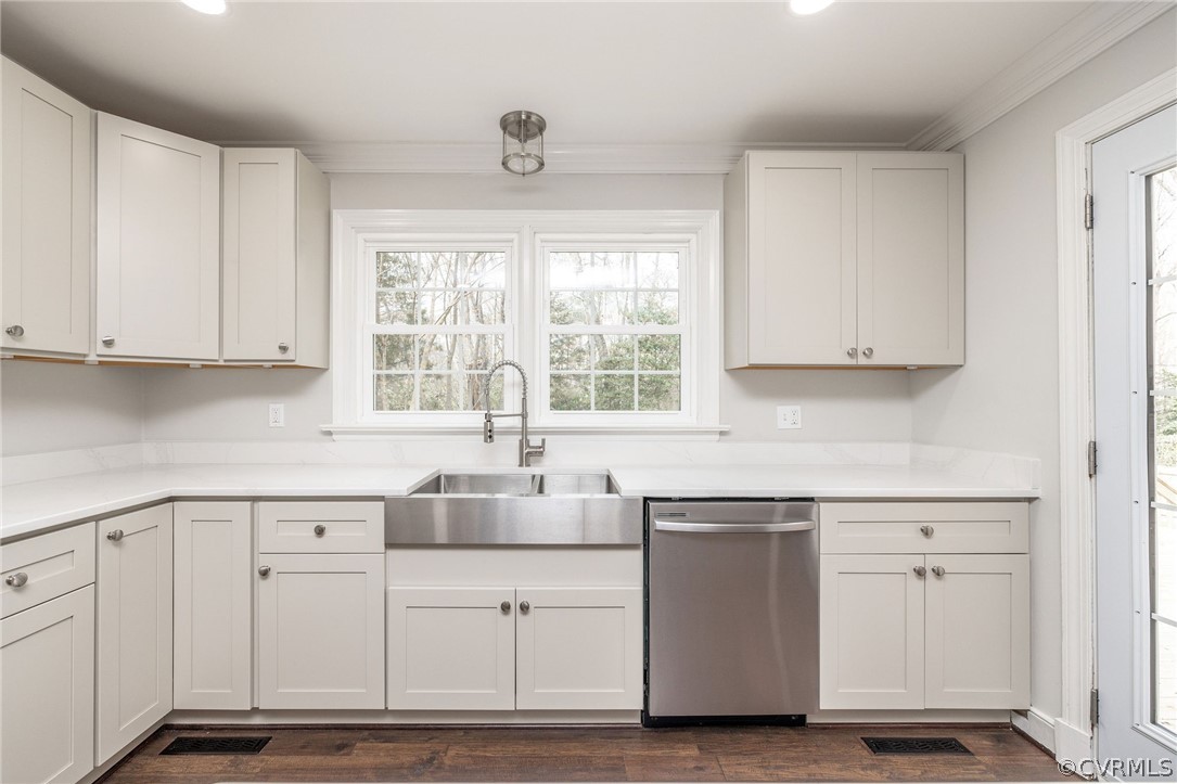 11633 Boyd Road Chester, VA 23831 - Photo 19 of 49 a kitchen with stainless steel appliances granite countertop a sink and cabinets with wooden floor