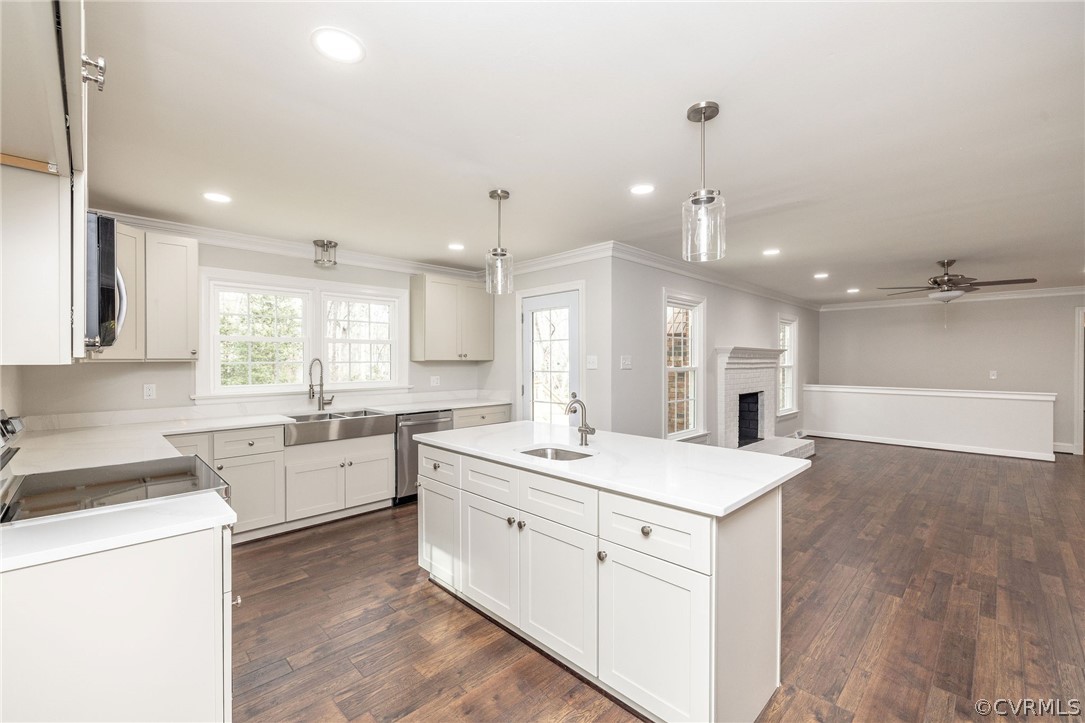 11633 Boyd Road Chester, VA 23831 - Photo 20 of 49 a kitchen with a sink stove and cabinets