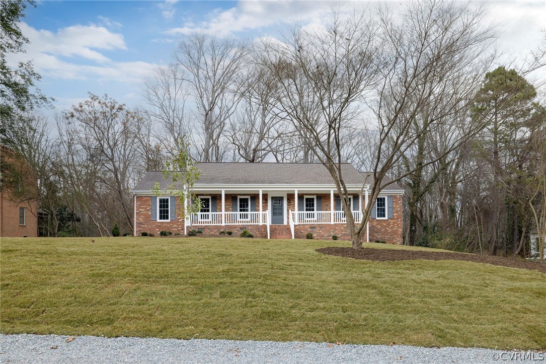 11633 Boyd Road Chester, VA 23831 - Photo 2 of 49 a front view of house with yard and trees around