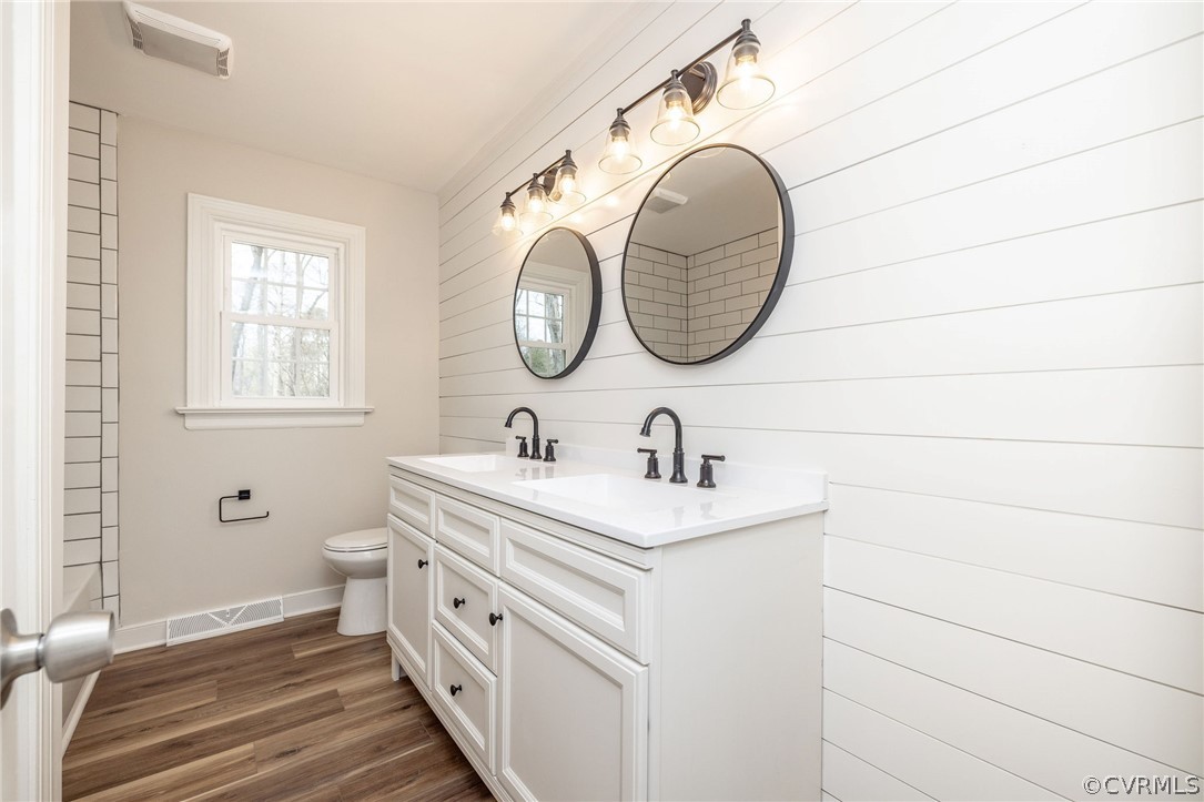 11633 Boyd Road Chester, VA 23831 - Photo 23 of 49 a bathroom with a sink and a mirror