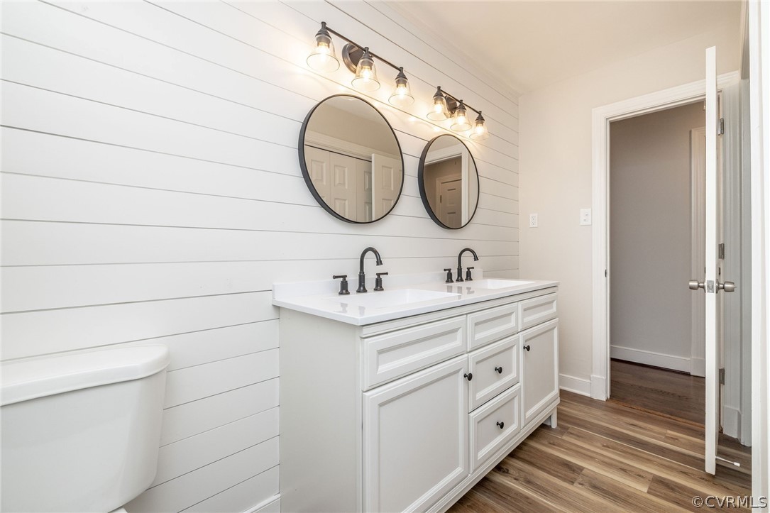 11633 Boyd Road Chester, VA 23831 - Photo 24 of 49 a bathroom with a double vanity sink and a mirror