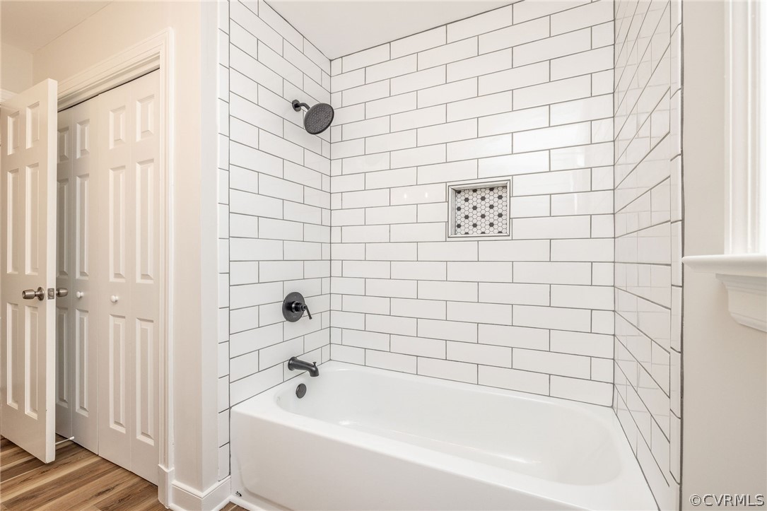 11633 Boyd Road Chester, VA 23831 - Photo 25 of 49 a bathroom with a bathtub