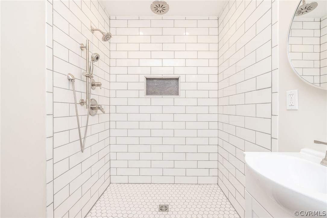 11633 Boyd Road Chester, VA 23831 - Photo 30 of 49 a bathroom with a bathtub and shower