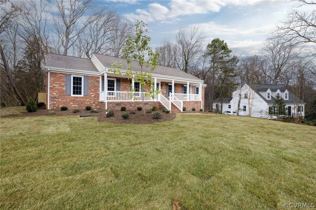 11633 Boyd Road Chester, VA 23831 - Photo 3 of 49 a front view of a house with garden
