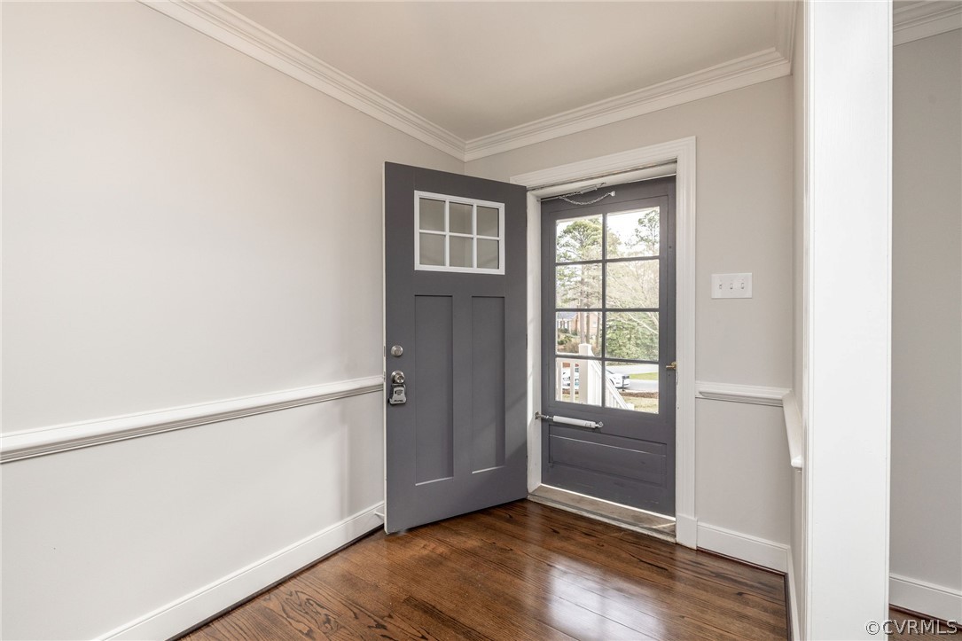 11633 Boyd Road Chester, VA 23831 - Photo 6 of 49 a view of an empty room with wooden floor and a window