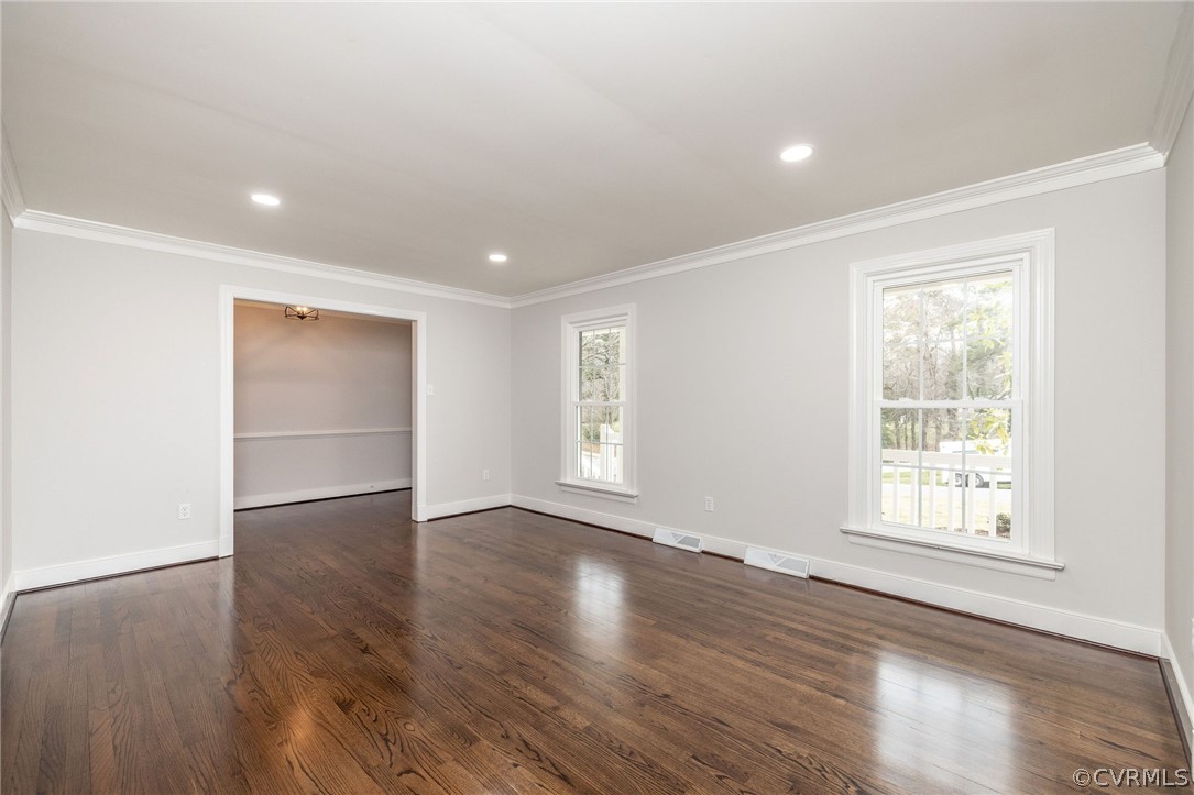 11633 Boyd Road Chester, VA 23831 - Photo 9 of 49 an empty room with wooden floor and windows