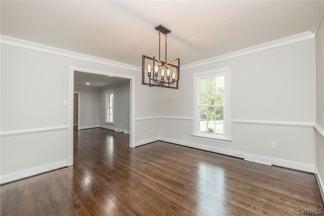 11633 Boyd Road Chester, VA 23831 - Photo 10 of 49 an empty room with wooden floor and windows