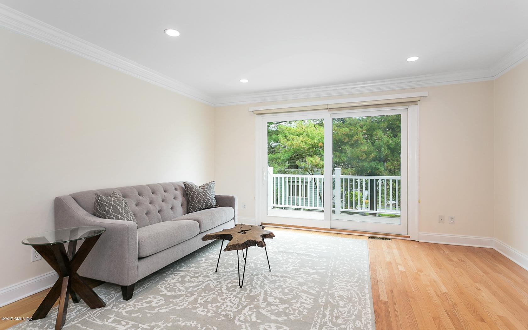 24 Whiffletree Way, Unit 24 Riverside, CT 06878 - Photo 11 of 29 a living room with furniture and a window