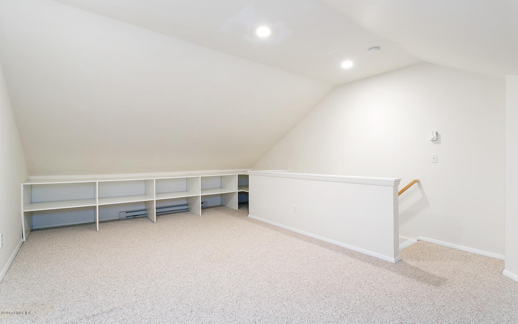 24 Whiffletree Way, Unit 24 Riverside, CT 06878 - Photo 17 of 29 a view of an empty room