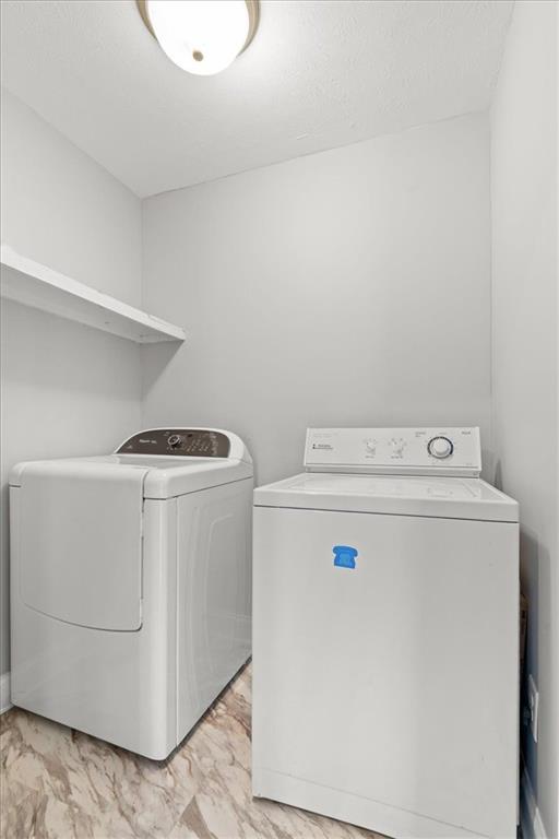81 Russell Drive Northeast Rome, GA 30165 - Photo 29 of 38 a utility room with dryer and washer