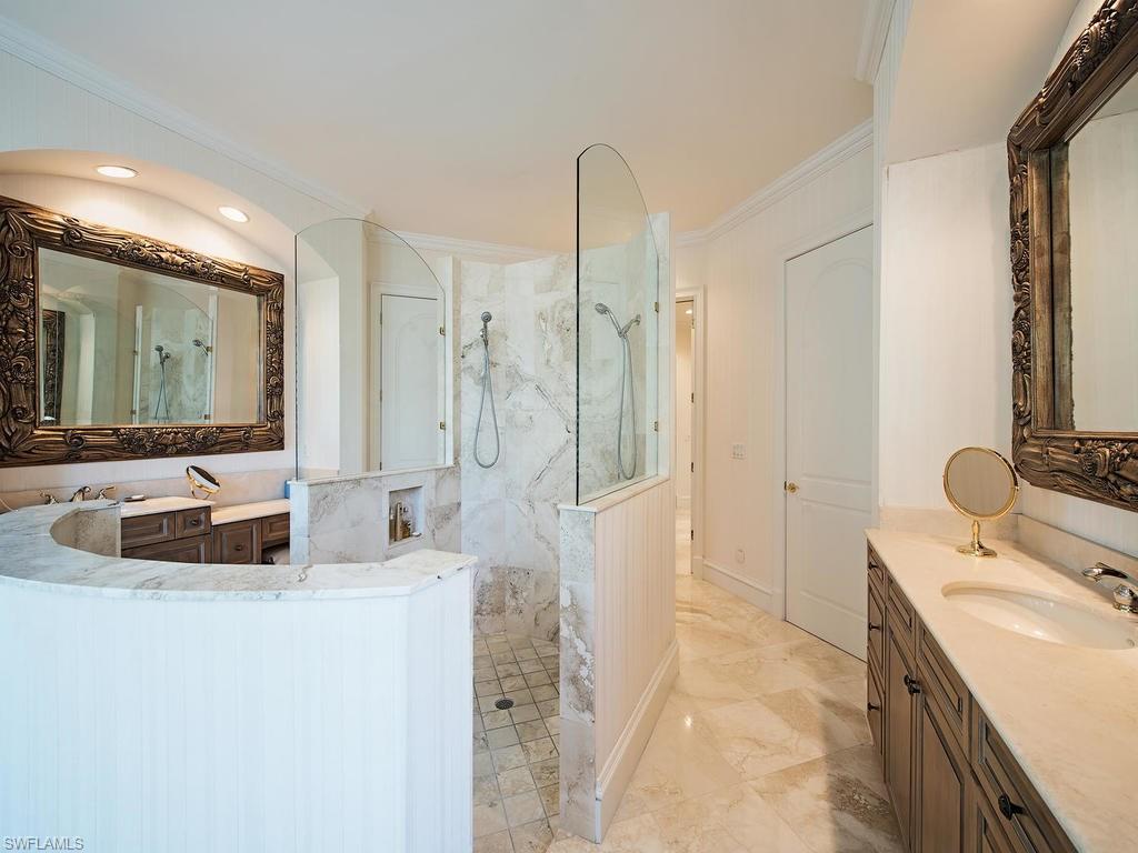 419 Mooring Line Drive Naples, FL 34102 - Photo 12 of 16 a bathroom with a double vanity sink mirror and double