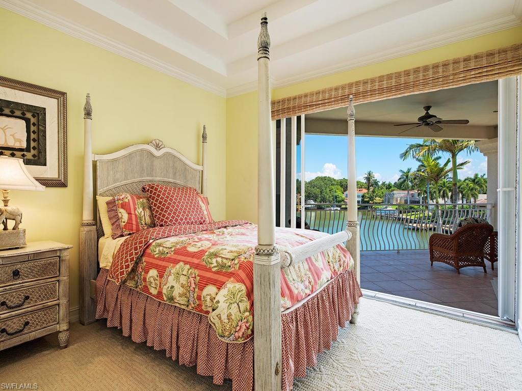 419 Mooring Line Drive Naples, FL 34102 - Photo 16 of 16 a bedroom with bed and a window