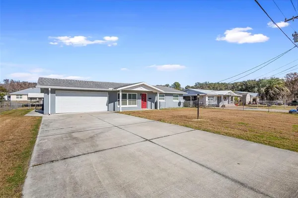 a view of house with outdoor space