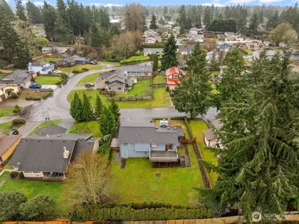 an aerial view of a house with a garden