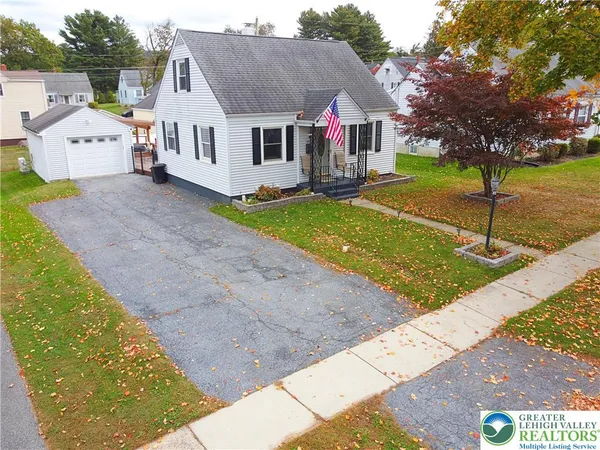 a front view of house with garden