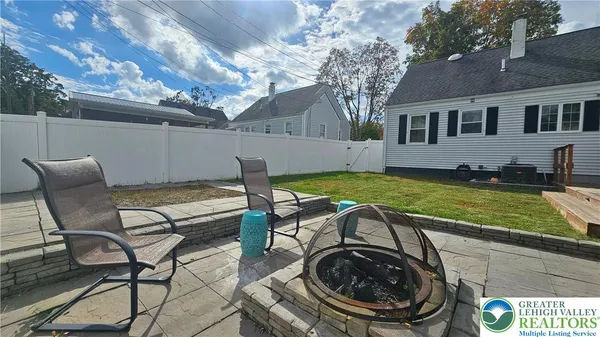 a view of house with outdoor space and entertaining space