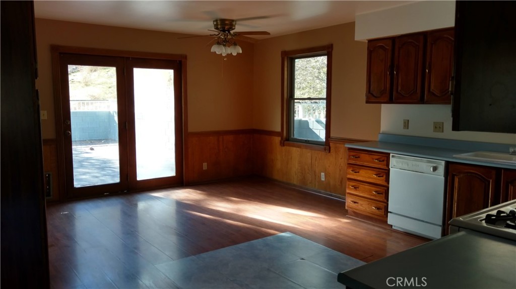 1792 Ash Road Wrightwood, CA 92397 - Photo 12 of 51 an empty room with windows and cabinet