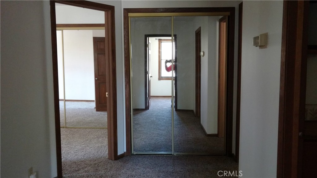 1792 Ash Road Wrightwood, CA 92397 - Photo 16 of 51 a view of a hallway with a glass door