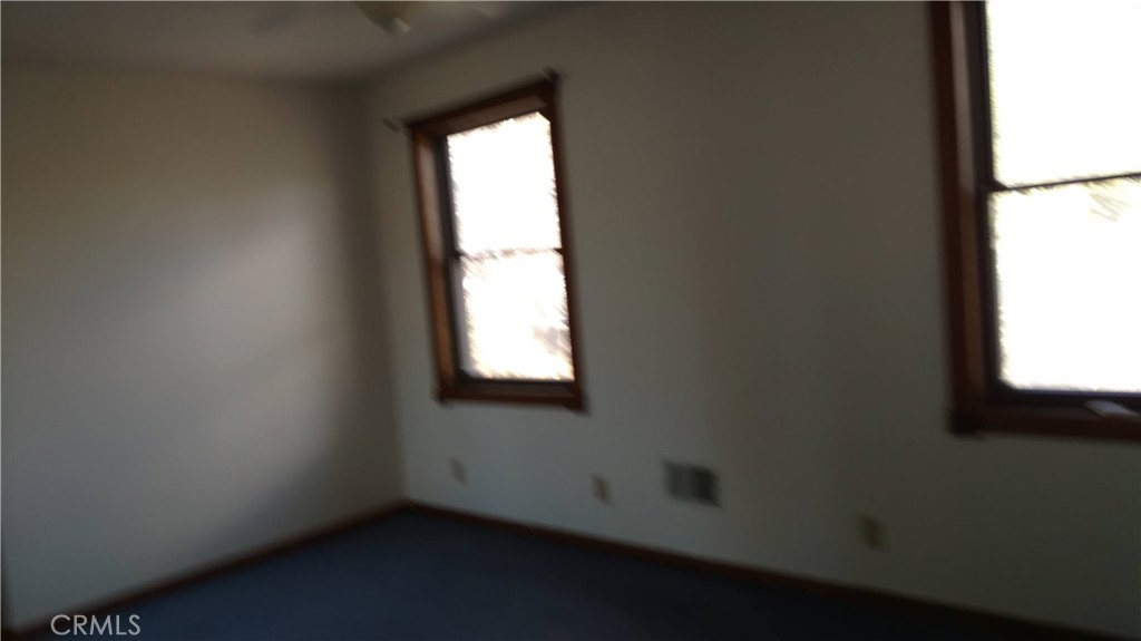 1792 Ash Road Wrightwood, CA 92397 - Photo 17 of 51 an empty room with a window