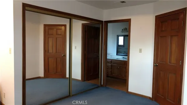 a bathroom with a bathtub and a toilet