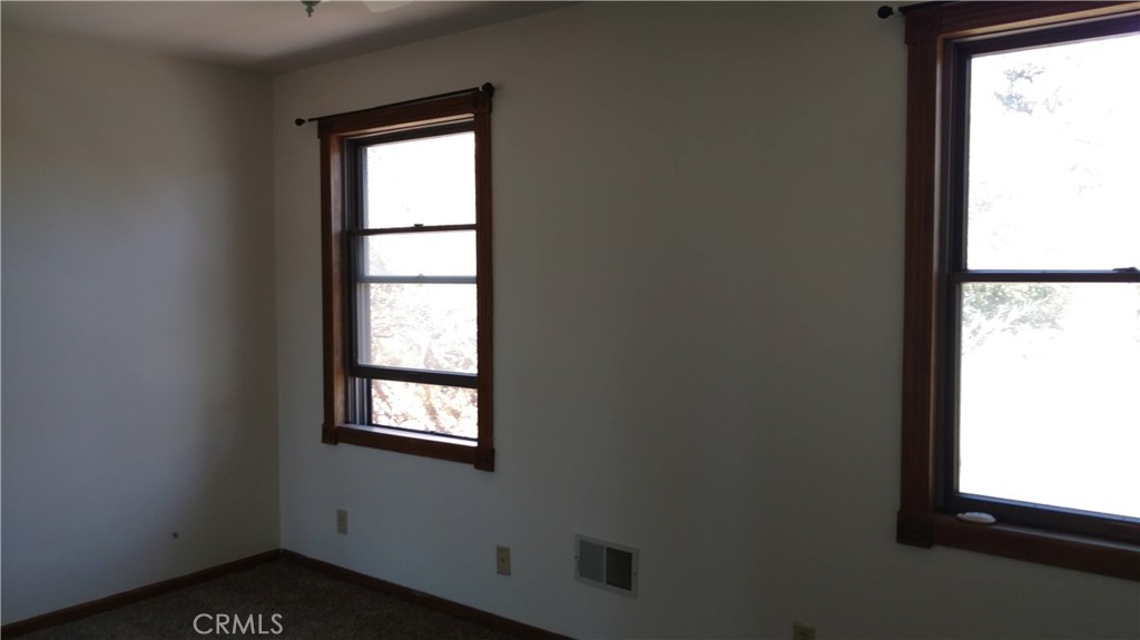 1792 Ash Road Wrightwood, CA 92397 - Photo 26 of 51 a view of an empty room with a window