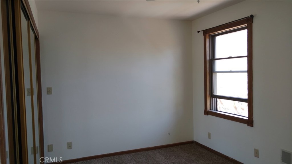 1792 Ash Road Wrightwood, CA 92397 - Photo 27 of 51 a view of an empty room and window