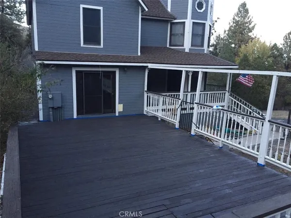 a view of a house with a deck