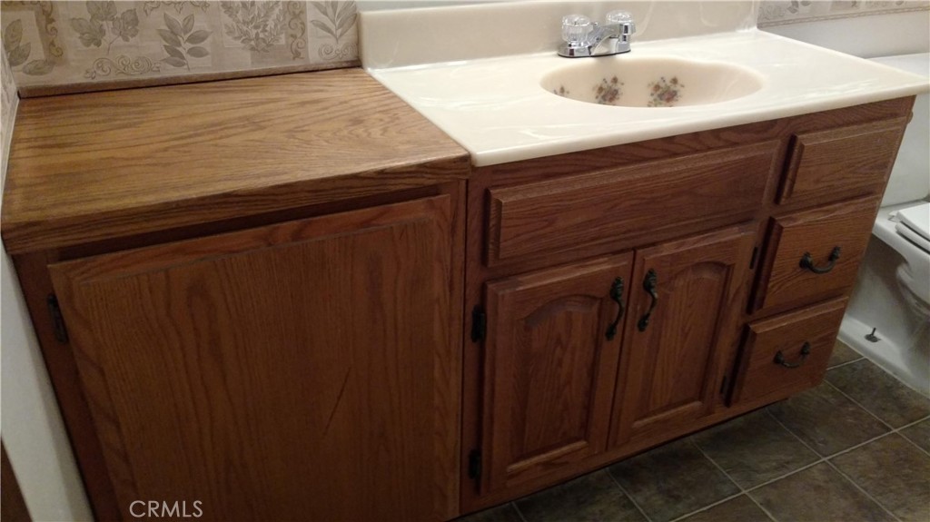 1792 Ash Road Wrightwood, CA 92397 - Photo 43 of 51 a bathroom with a sink and a mirror