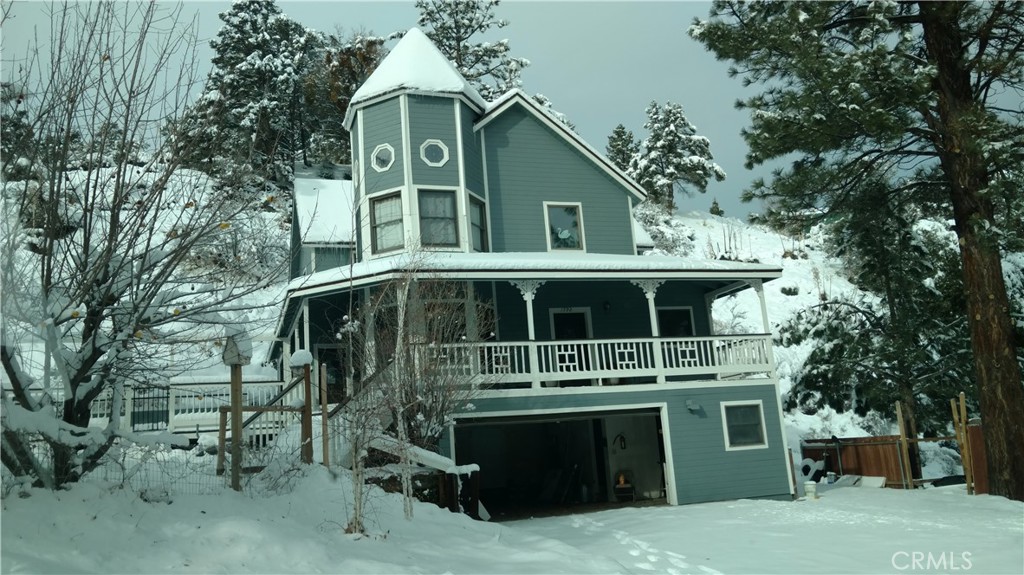 1792 Ash Road Wrightwood, CA 92397 - Photo 49 of 51 a front view of a house with a garden