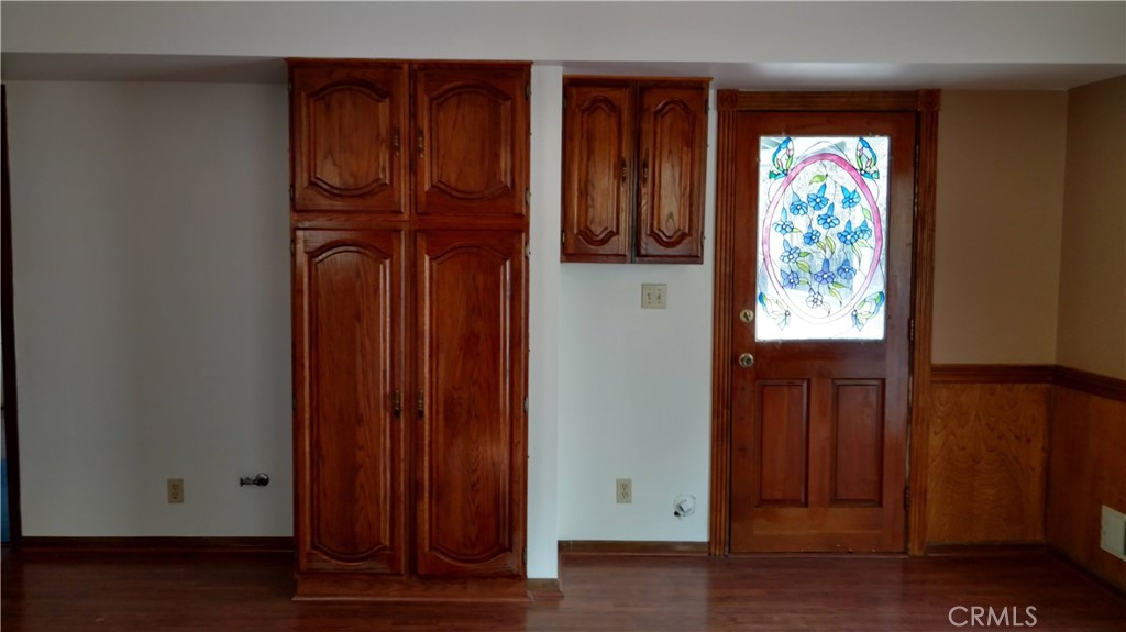 1792 Ash Road Wrightwood, CA 92397 - Photo 5 of 51 a view of front door with wooden floor