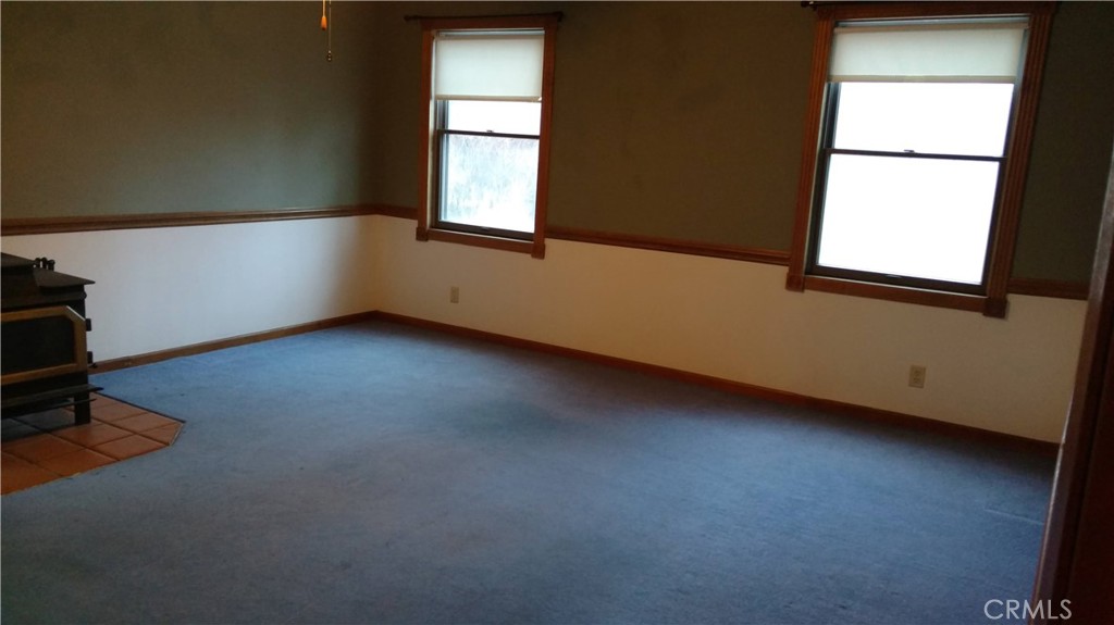 1792 Ash Road Wrightwood, CA 92397 - Photo 8 of 51 an empty room with a window
