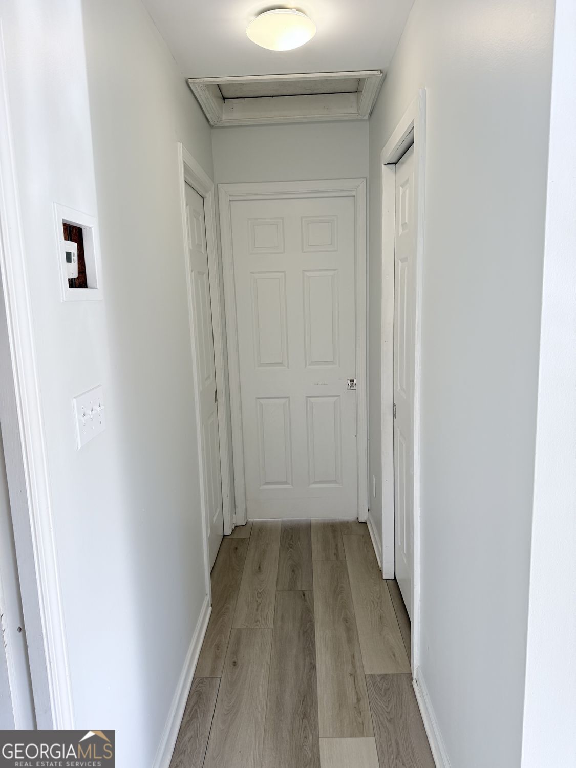 477 Benton Court Southwest Lawrenceville, GA 30044 - Photo 11 of 17 a view of a bathroom with wooden floor