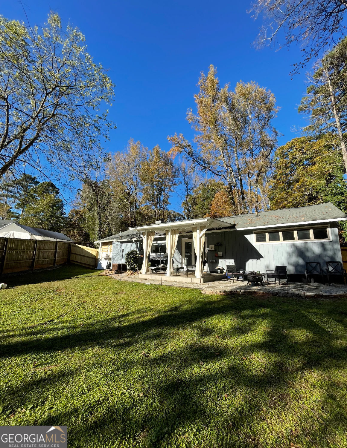477 Benton Court Southwest Lawrenceville, GA 30044 - Photo 17 of 17 a view of a house with a big yard
