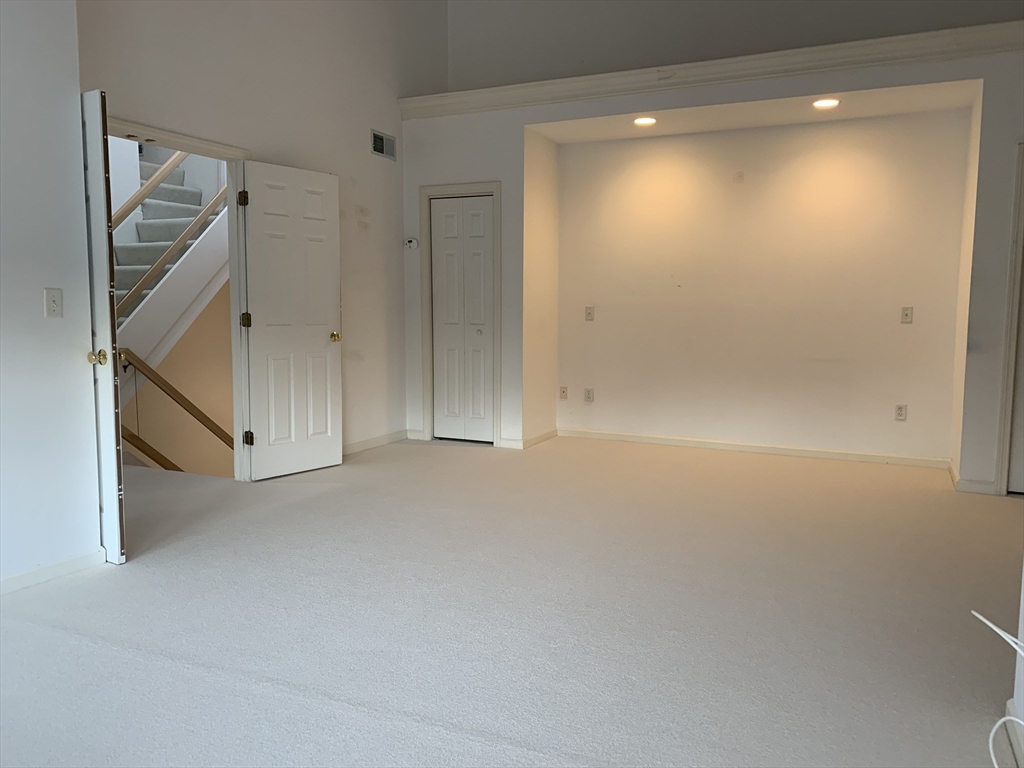 73 Half Crown Circle, Unit 73 Ashland, MA 01721 - Photo 13 of 18 a view of an empty room