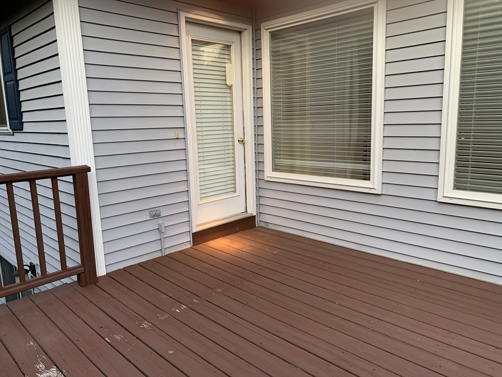 73 Half Crown Circle, Unit 73 Ashland, MA 01721 - Photo 8 of 18 a view of a room with wooden floor